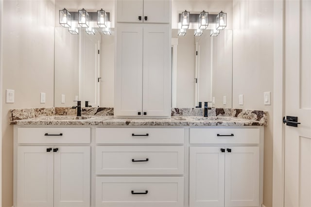 1052 Foxtail Dr, Kalispell, MT 59901 - bathroom featuring a sink and double vanity