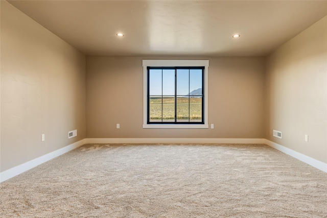 1052 Foxtail Dr, Kalispell, MT 59901 - empty room featuring baseboards, visible vents, carpet, and recessed lighting