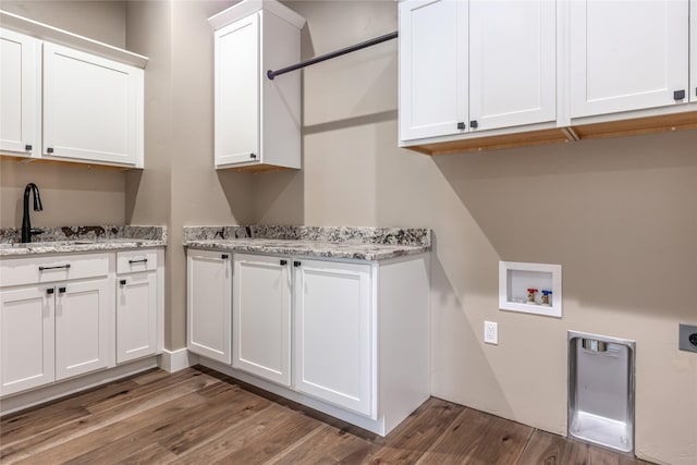 1052 Foxtail Dr, Kalispell, MT 59901 - clothes washing area with cabinet space, hookup for a washing machine, dark wood-style floors, and a sink