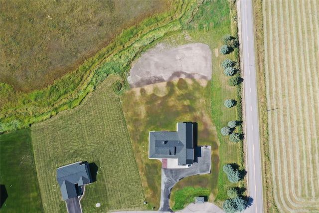 birds eye view of property featuring a rural view