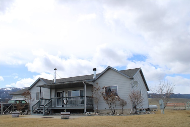 95 Furman Ln, East Helena, MT 59635 - rear view of property with a porch and a yard