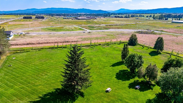 aerial view featuring a mountain view and a rural view