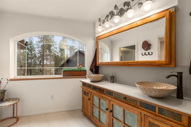 bathroom featuring vanity and tile patterned flooring