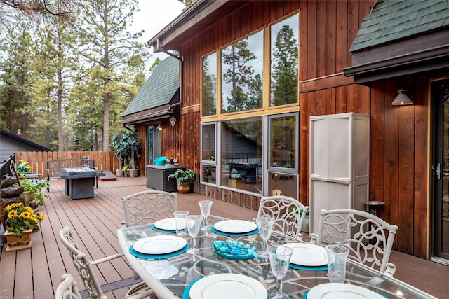 deck featuring an outdoor fire pit