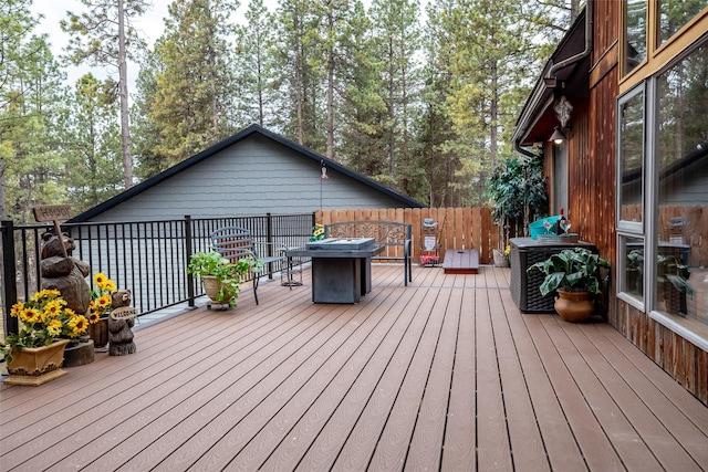 deck featuring an outdoor fire pit