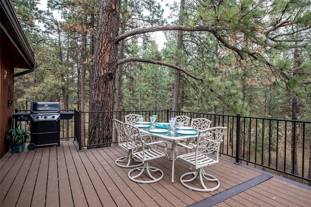 wooden deck with grilling area