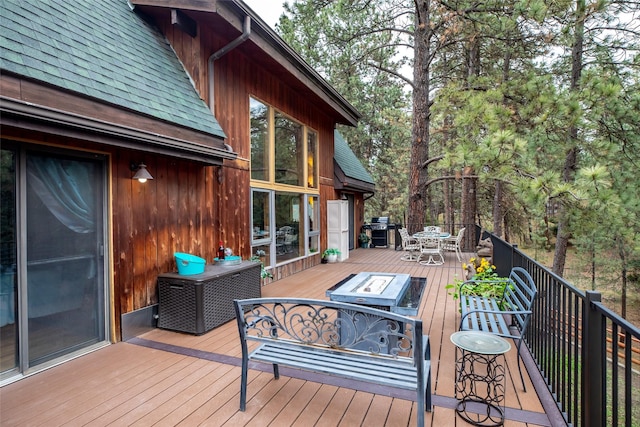 wooden deck with area for grilling