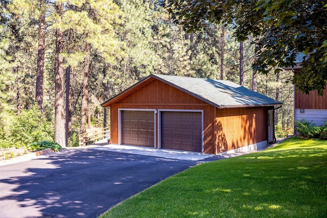 garage with a lawn