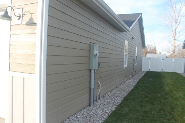 view of home's exterior featuring a yard