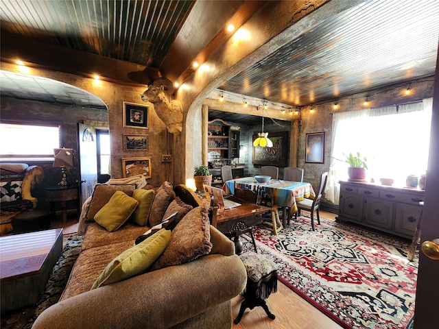 living room with wooden ceiling and hardwood / wood-style floors