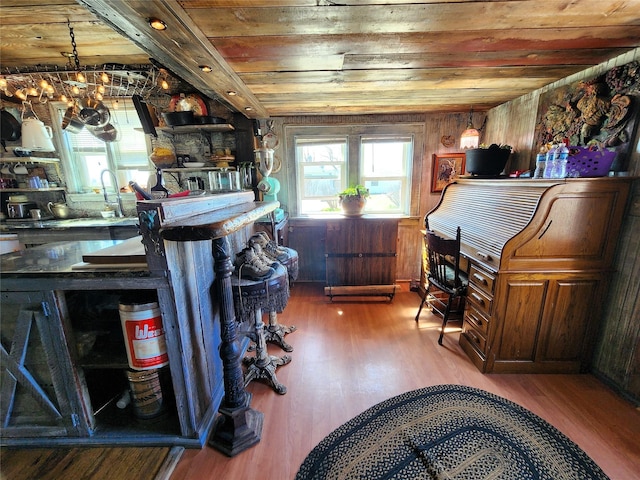 116 3rd Ave NE, Dutton, MT 59433 - bar featuring wood ceiling, wood finished floors, and wood walls