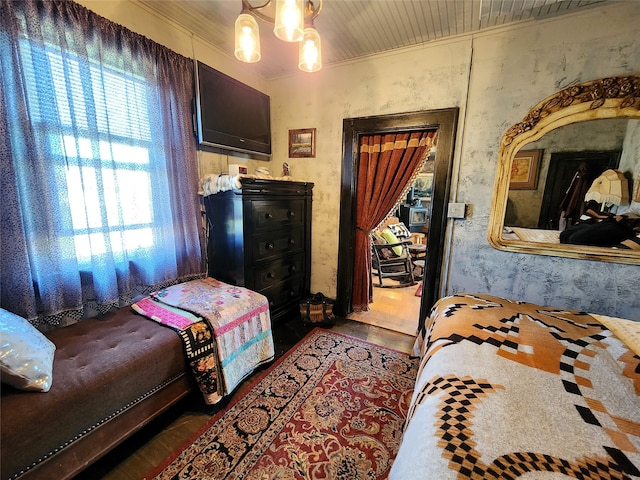 bedroom featuring an inviting chandelier