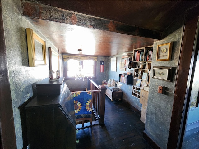 116 3rd Ave NE, Dutton, MT 59433 - kitchen featuring dark wood-type flooring, a chandelier, and beamed ceiling