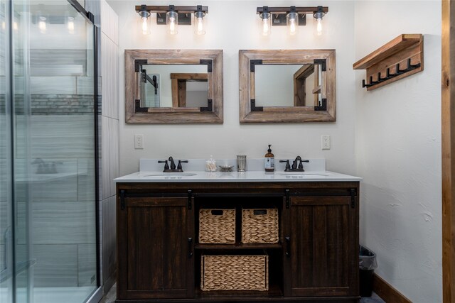 bathroom featuring double vanity and an enclosed shower