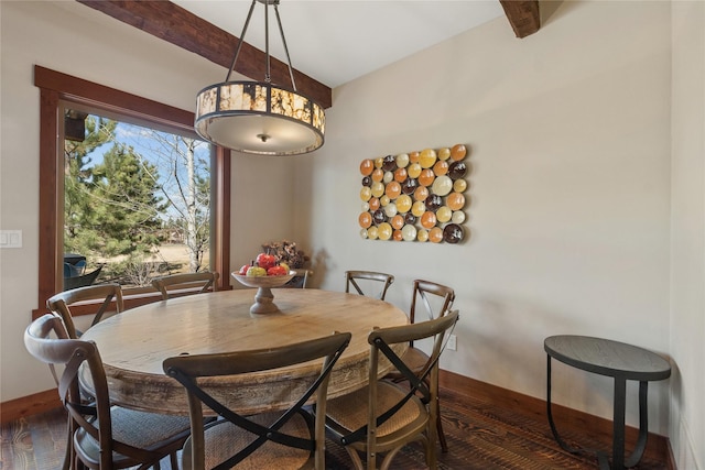 87 Rusty Iron Way, Eureka, MT 59917 - dining room featuring wood finished floors and beam ceiling