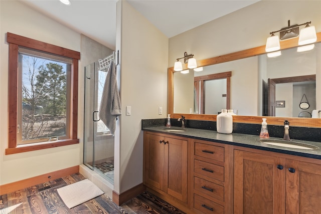 87 Rusty Iron Way, Eureka, MT 59917 - bathroom with an enclosed shower, hardwood / wood-style floors, and vanity