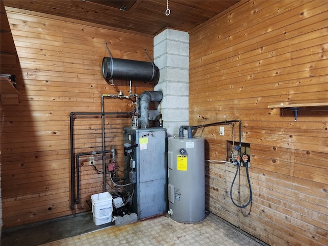 utility room featuring water heater