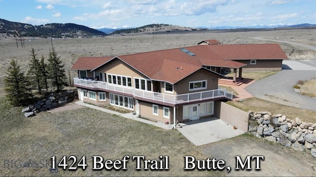 aerial view featuring a mountain view