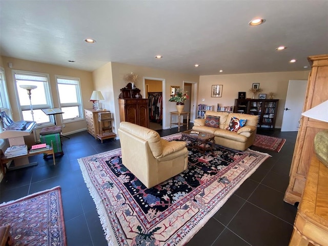 living room with dark tile floors