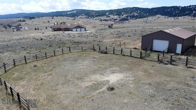 bird's eye view with a rural view and a mountain view