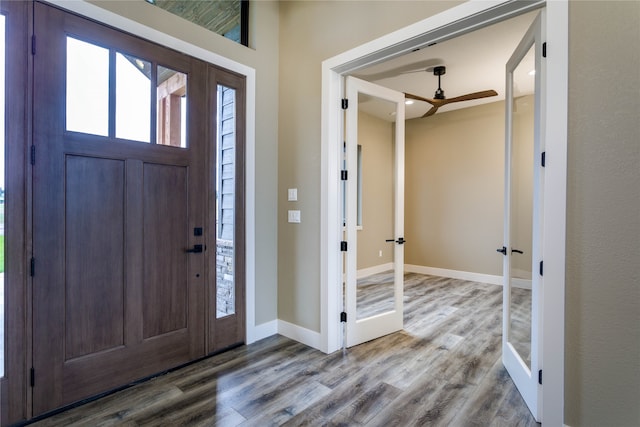 entryway with wood-type flooring