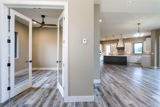 114 Pheasant Ridge Ct, Polson, MT 59860 - corridor featuring wood finished floors, recessed lighting, and baseboards