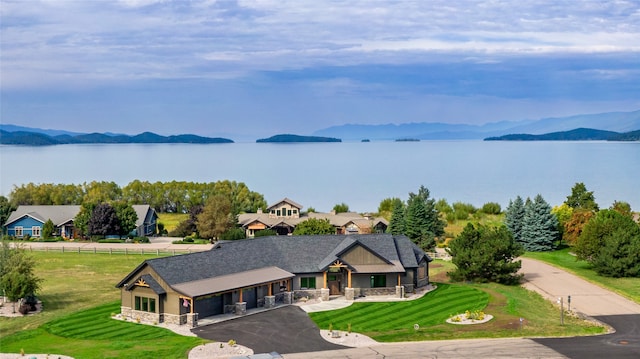 bird's eye view with a water and mountain view