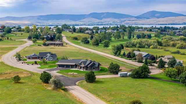 drone / aerial view featuring a mountain view