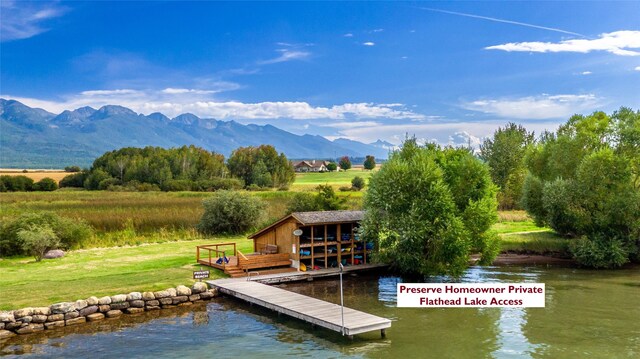 114 Pheasant Ridge Ct, Polson, MT 59860 - dock with a yard and a deck with water view