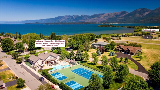 114 Pheasant Ridge Ct, Polson, MT 59860 - bird's eye view of a water and mountain view and a pool area