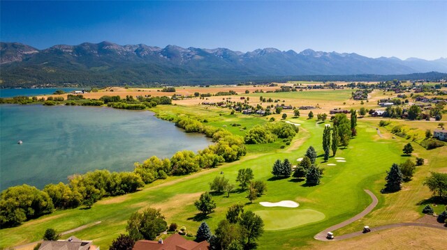 114 Pheasant Ridge Ct, Polson, MT 59860 - bird's eye view of a water and mountain view and a golf club