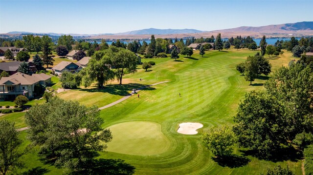 114 Pheasant Ridge Ct, Polson, MT 59860 - drone / aerial view of a water and mountain view and a golf club