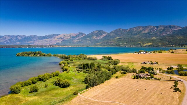 114 Pheasant Ridge Ct, Polson, MT 59860 - drone / aerial view of a water and mountain view
