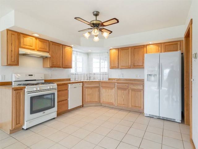 kitchen featuring ceiling fan, white appliances, sink, and light tile floors