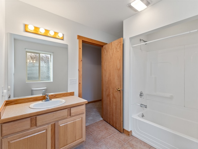 full bathroom with shower / tub combination, vanity, toilet, and tile floors