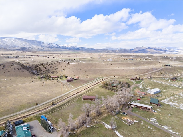 aerial view with a mountain view and a rural view