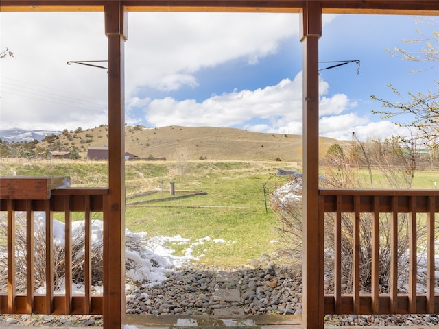 view of yard featuring a mountain view and a rural view