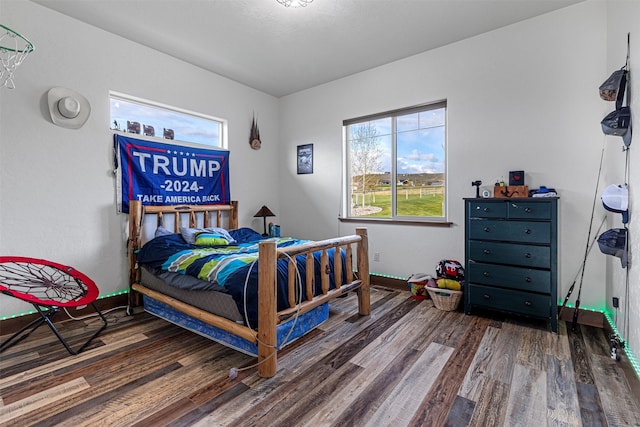 bedroom featuring dark hardwood / wood-style floors