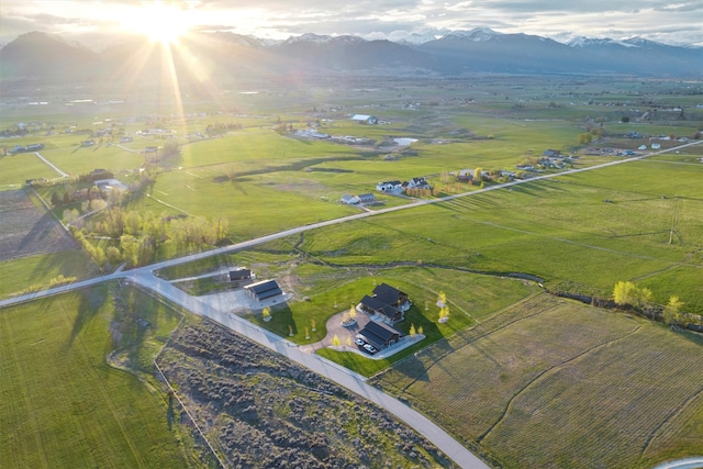 aerial view featuring a rural view and a mountain view