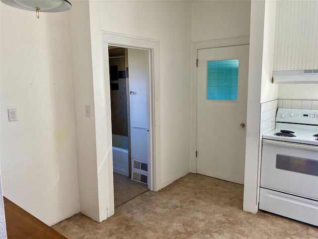 kitchen with exhaust hood, light tile flooring, and white electric range