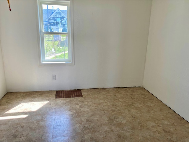 view of tiled empty room