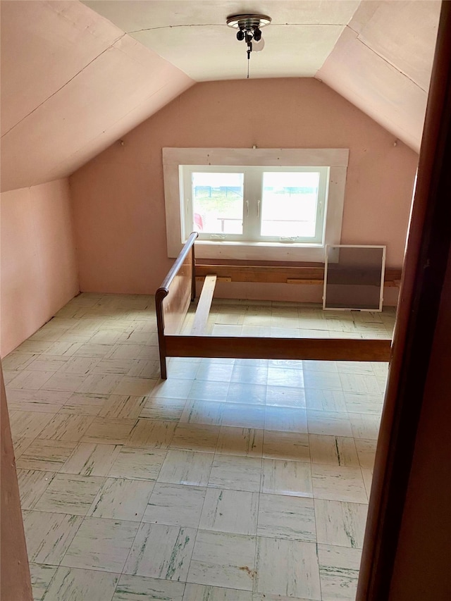 bonus room with vaulted ceiling