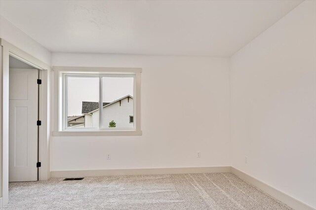 view of carpeted spare room