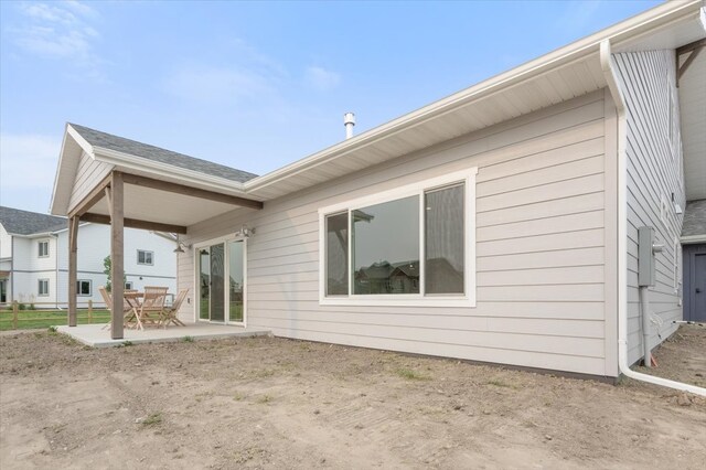 back of house featuring a patio area