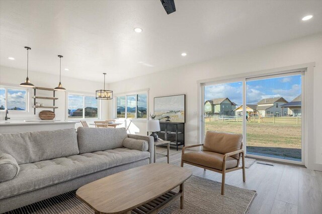5539 Fireweed Loop, Helena, MT 59602 - living area with visible vents, light wood-style flooring, and recessed lighting
