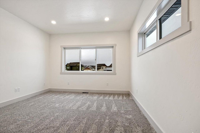 view of carpeted spare room