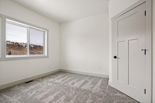 view of carpeted empty room