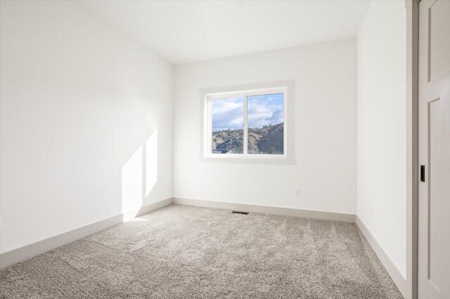5539 Fireweed Loop, Helena, MT 59602 - unfurnished room featuring baseboards, visible vents, and carpet floors