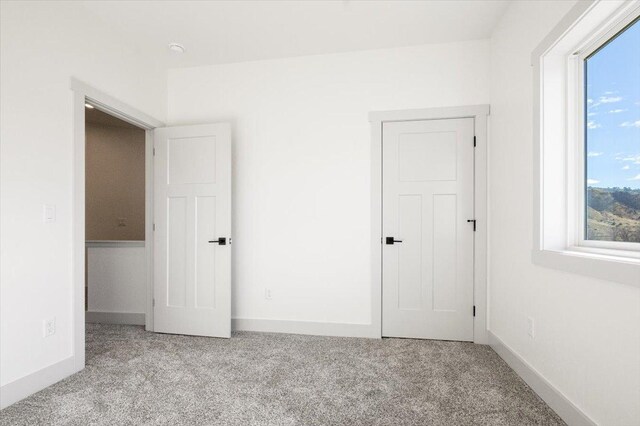 5539 Fireweed Loop, Helena, MT 59602 - stairway with visible vents, baseboards, and carpet flooring