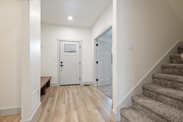 foyer with light hardwood / wood-style flooring